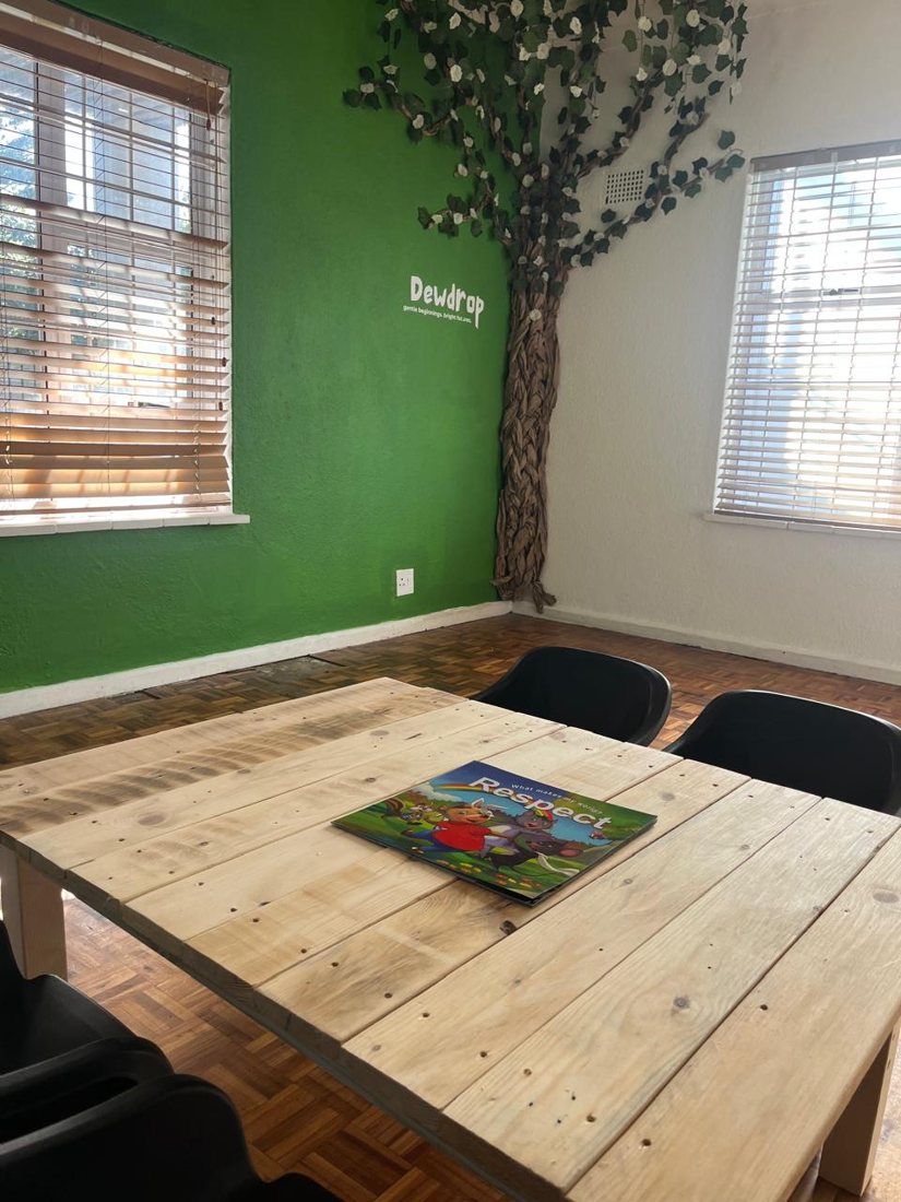 Green classroom with a story book