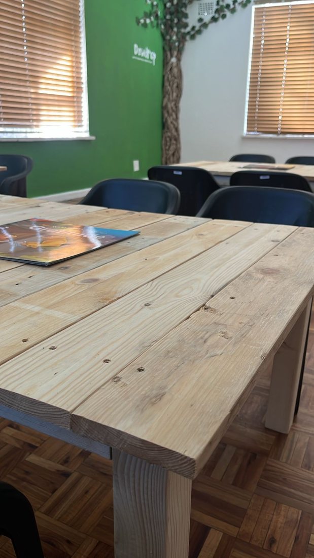 Children's tables in a green classroom