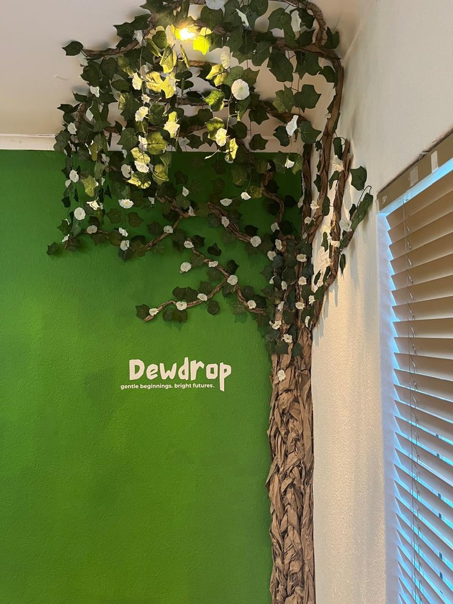 The Dewdrop storytelling tree wall